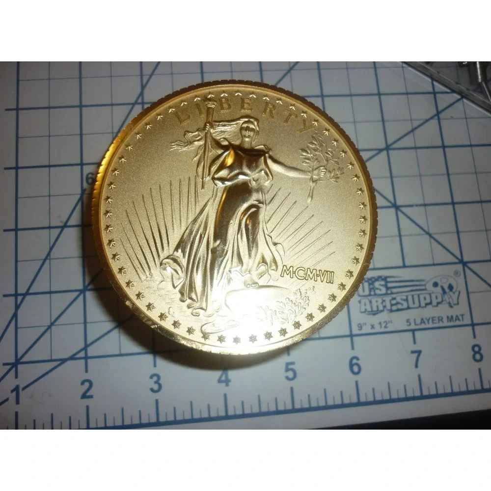 Bulova B0675 Gold Tone Coin Face Eagle Quartz Alarm‎ Desk Clock Roman Numerals